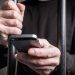 6 ani de închisoare pentru un comisar de penitenciar, acuzat că ajuta deținuți să primească telefoane mobile