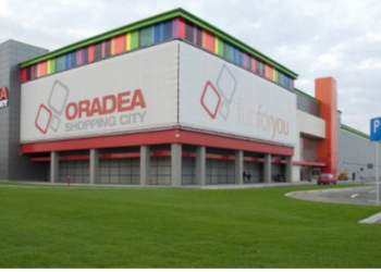 Milionarul care a vândut la sfert de preț  mall-ul Oradea Shopping City firmei la care  e acționar Lotus Center, construiește un cartier rezidențial cu turnuri de 18 etaje