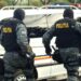 Percheziţii în forţă ale poliţiştilor şi mascaţilor din Gorj la mai multe firme de pompe funebre / Suspiciuni de evaziune fiscală de 400.000 de lei în afacerile cu morţi