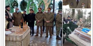 GALERIE. Sute de militari și civili au mers în urma afetului de tun cu care a fost dus la cimitir generalul Lungu. Îngropat cu onoruri militare
