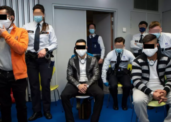 Tânărul care ziua culegea roșii în Belgia și noaptea se prostitua, transferat să execute 23 de ani de pușcărie în România după ce și-a ucis un client